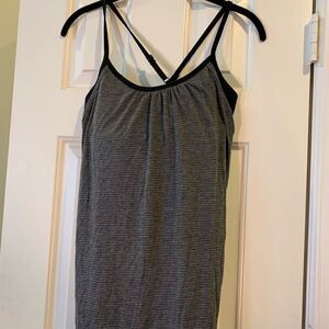 Calia T-shirt tank with black bra top.  Not padded
